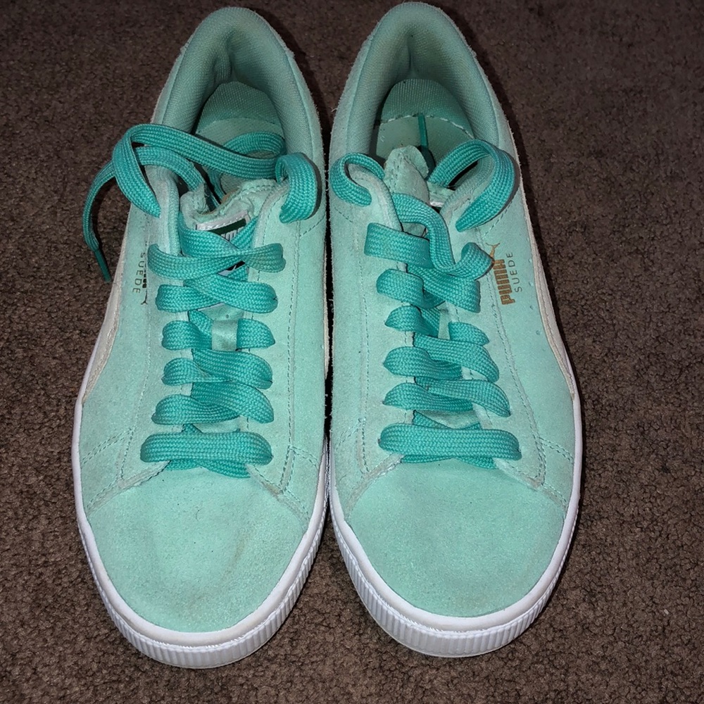 Mint green puma sneakers